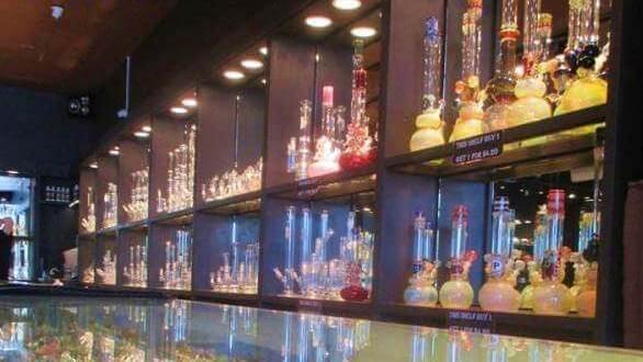 top online headshops shelf of bongs in a store