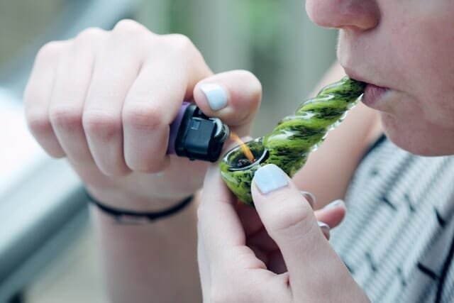 woman smoking cannabis nevada cannabis tourism guise