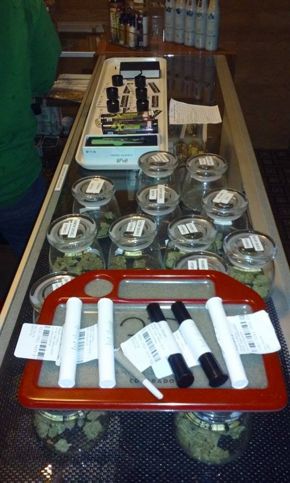 display case with a variety of cannabis products